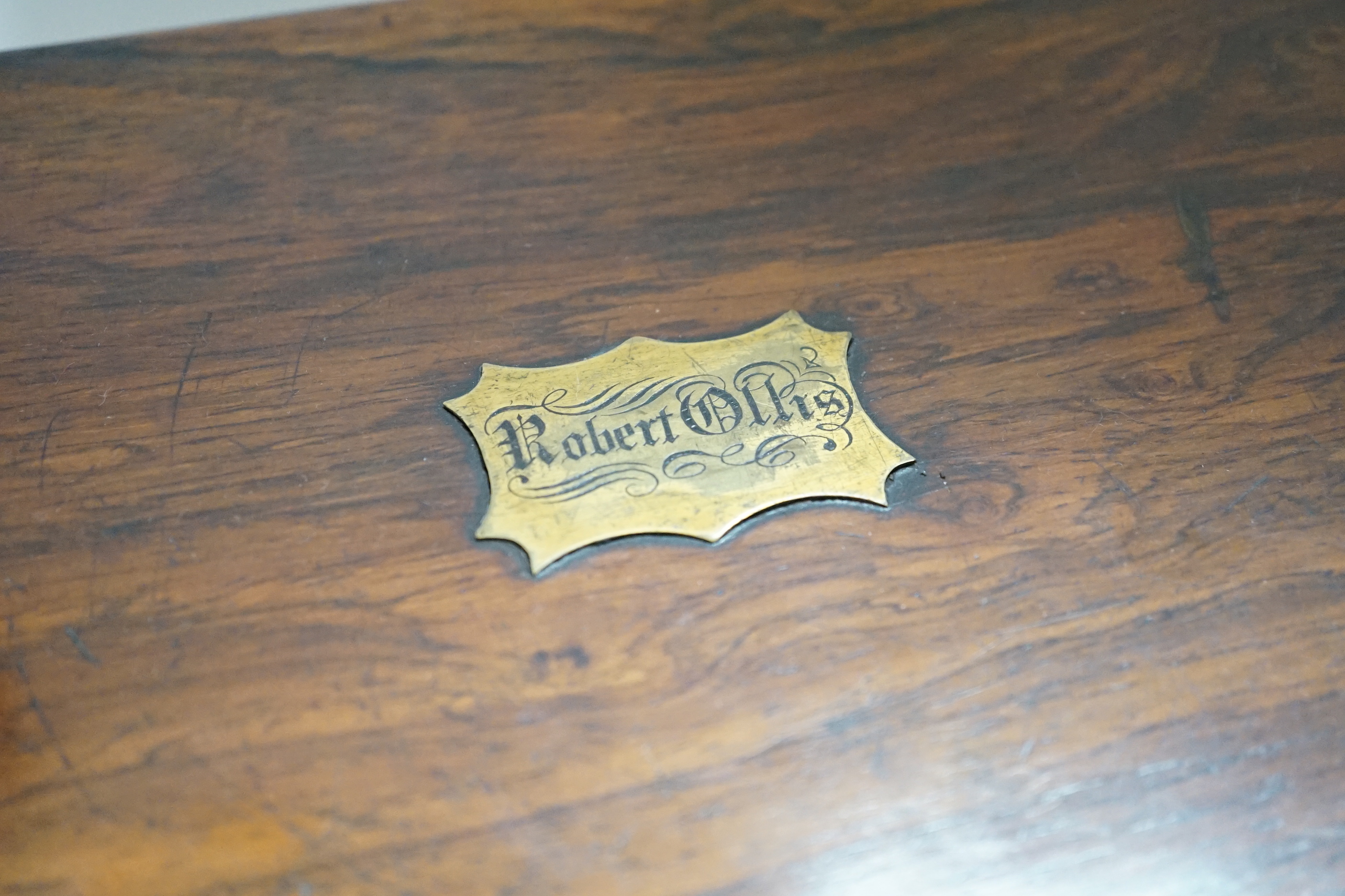A Victorian rosewood brass bound writing slope, 40cm wide x 15cm high